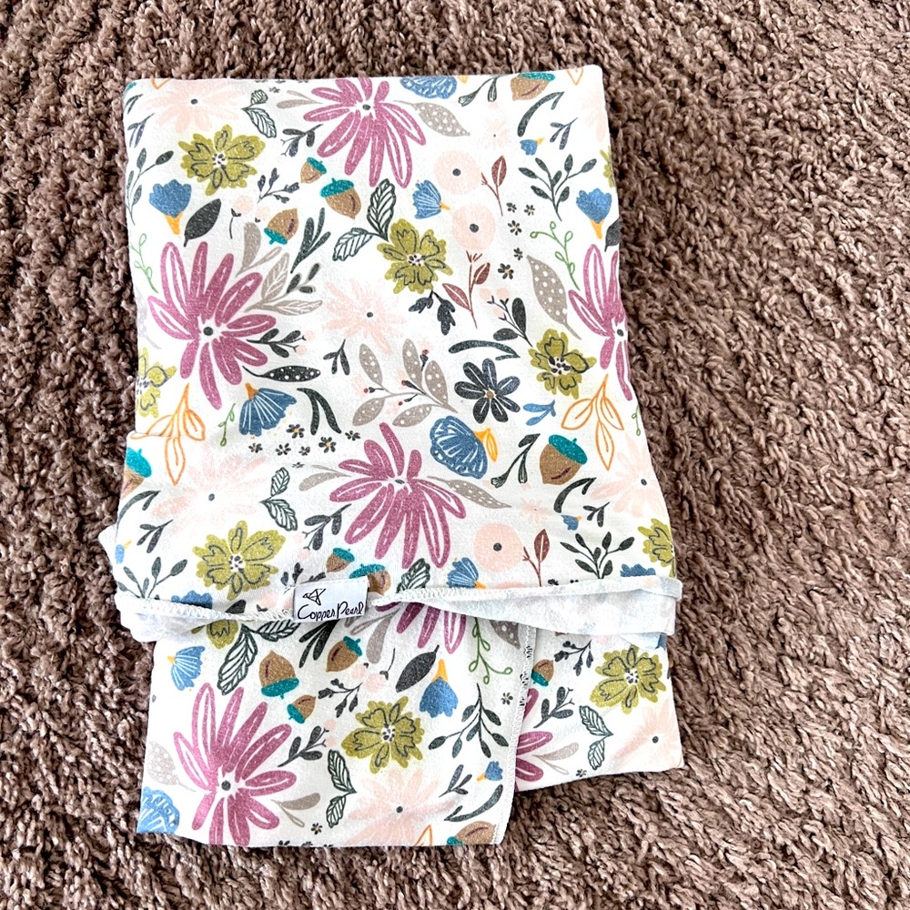 Copper Pearl baby swaddle blanket in “Olive” floral print 46” x 46” size.